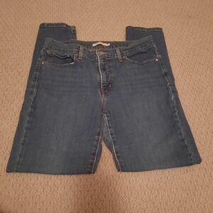 311 Shaping Skinny Levi's, women's denim blue jeans, size 31, preowned.